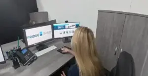 Lisa from the FridgeSmart team at work in the office